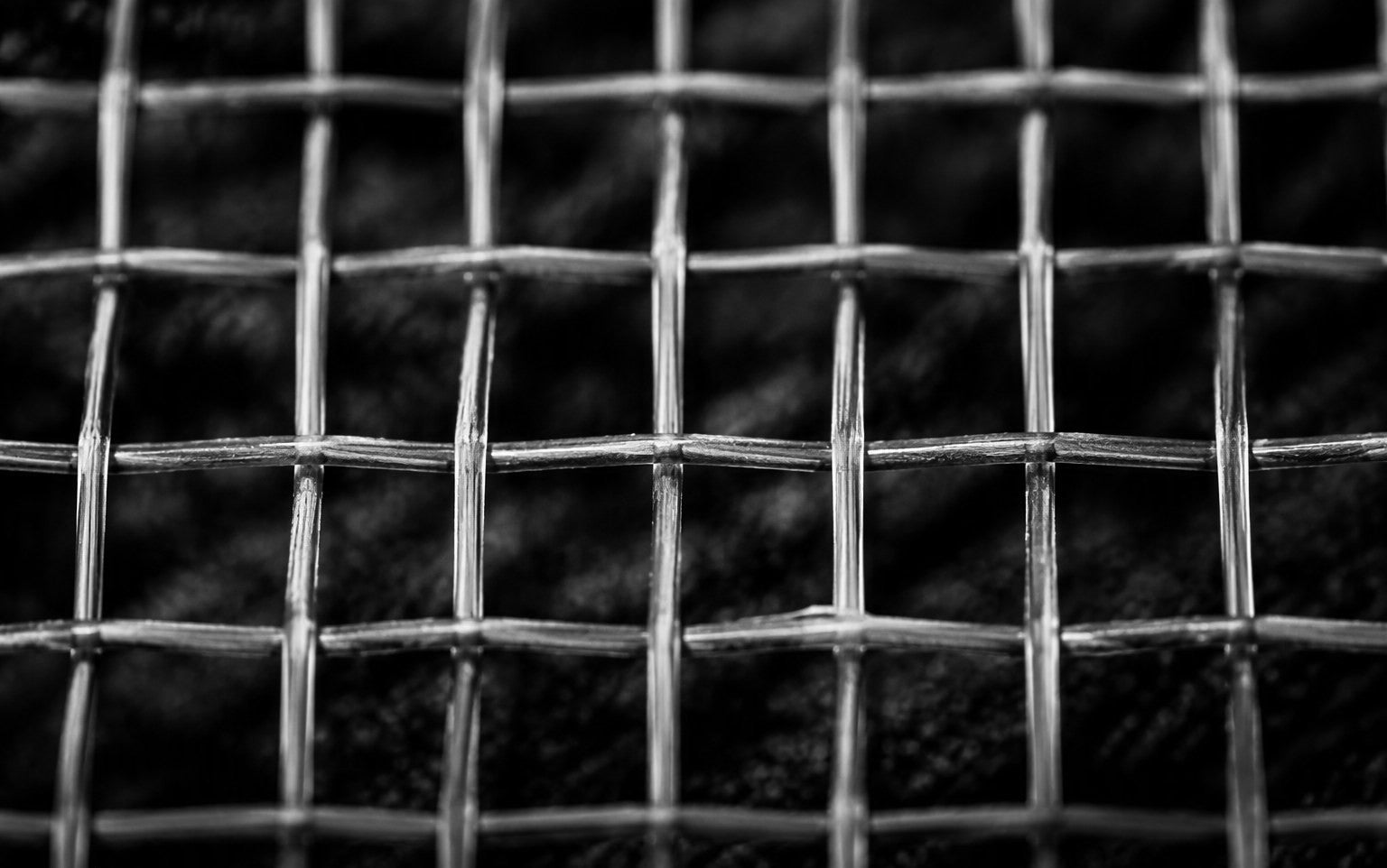 Close-up of a freshly strung racquet string bed